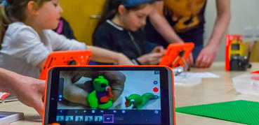Children creating with tablets