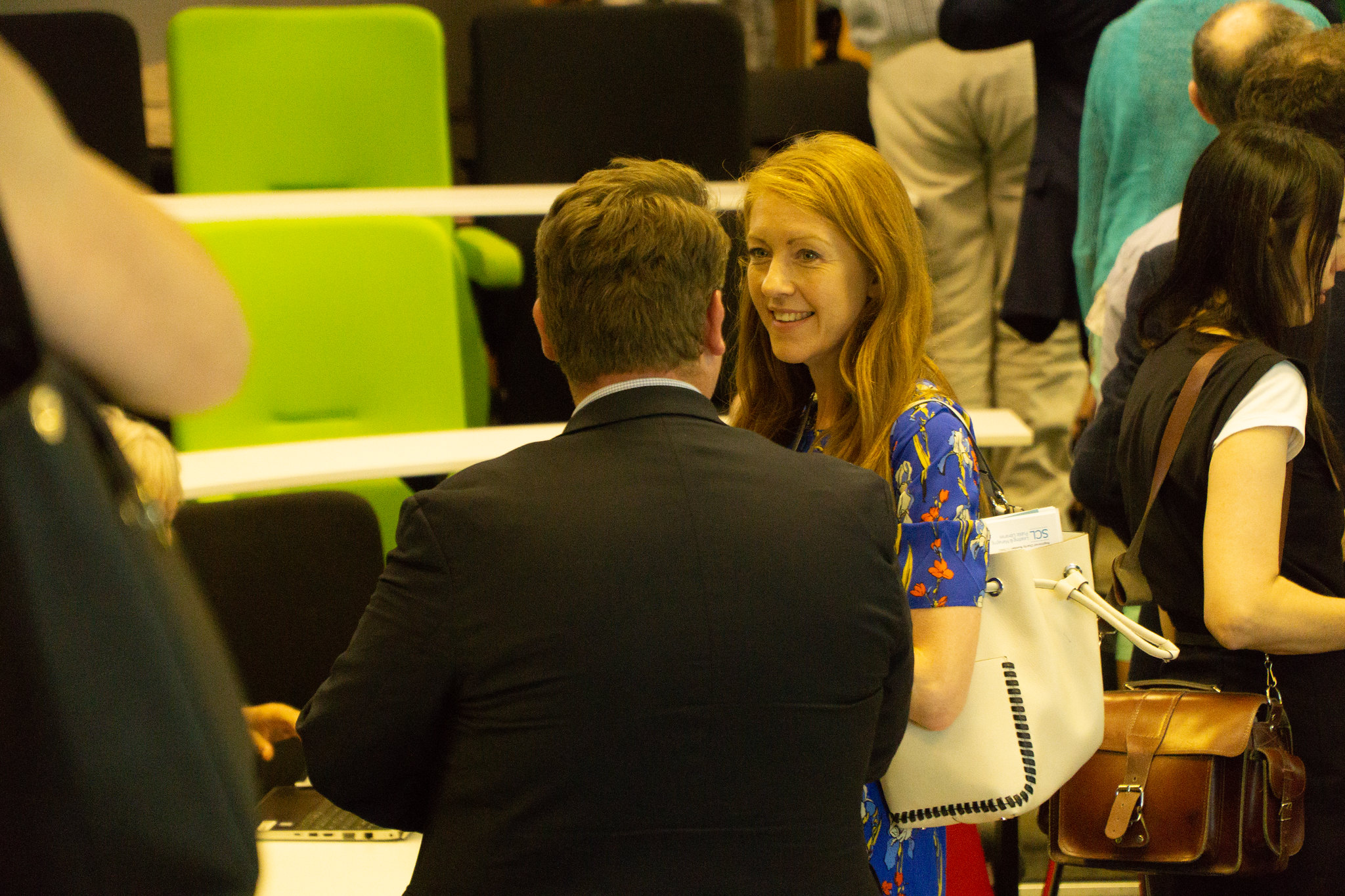 Delegates networking at a seminar