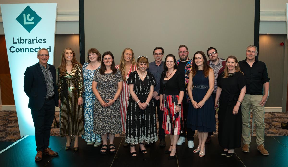 Libraries Connected Staff stood in a group on stage