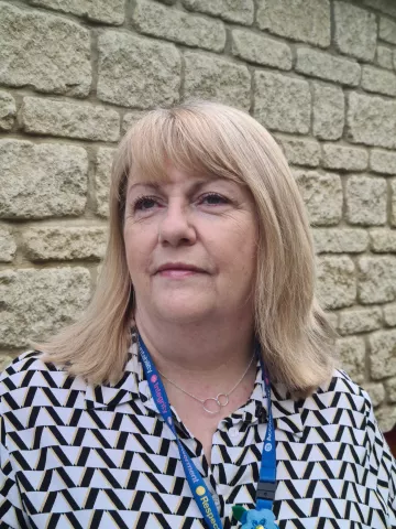 Sally Williams looks into the camera. 
