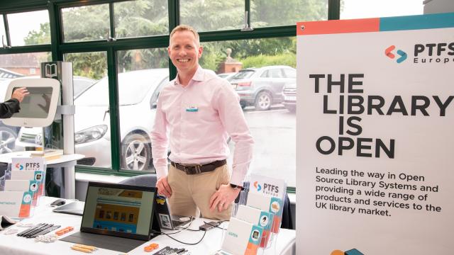 Person stood at a sponsor's stand