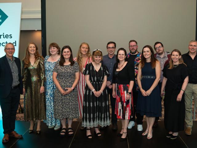 Libraries Connected Staff stood in a group on stage