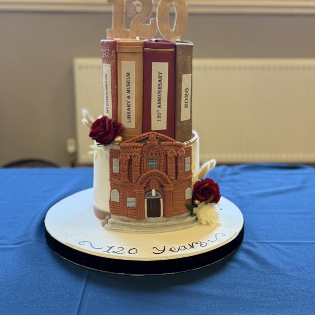 A cake celebrating 120 years of Westhoughton Library.